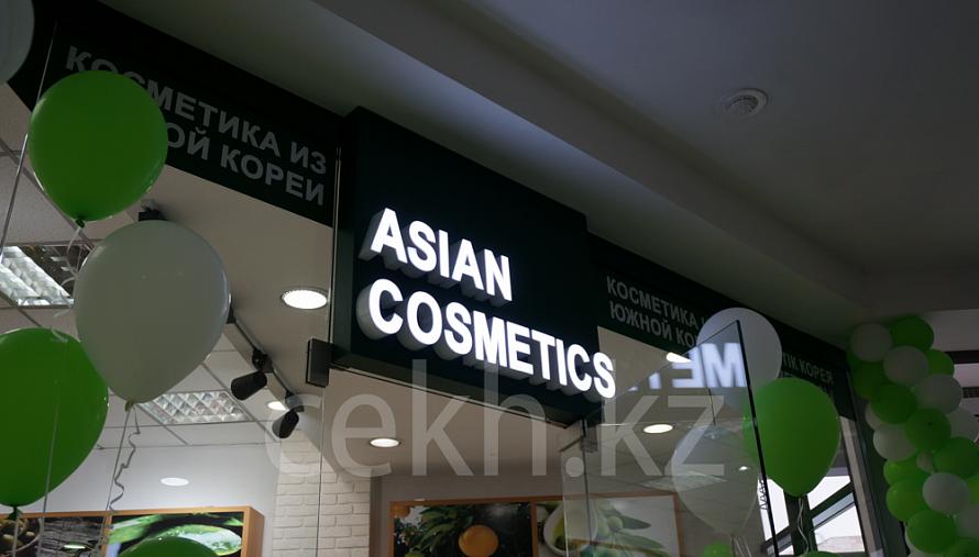  «Asian cosmetics» дүкенінің белгісі мен безендіру